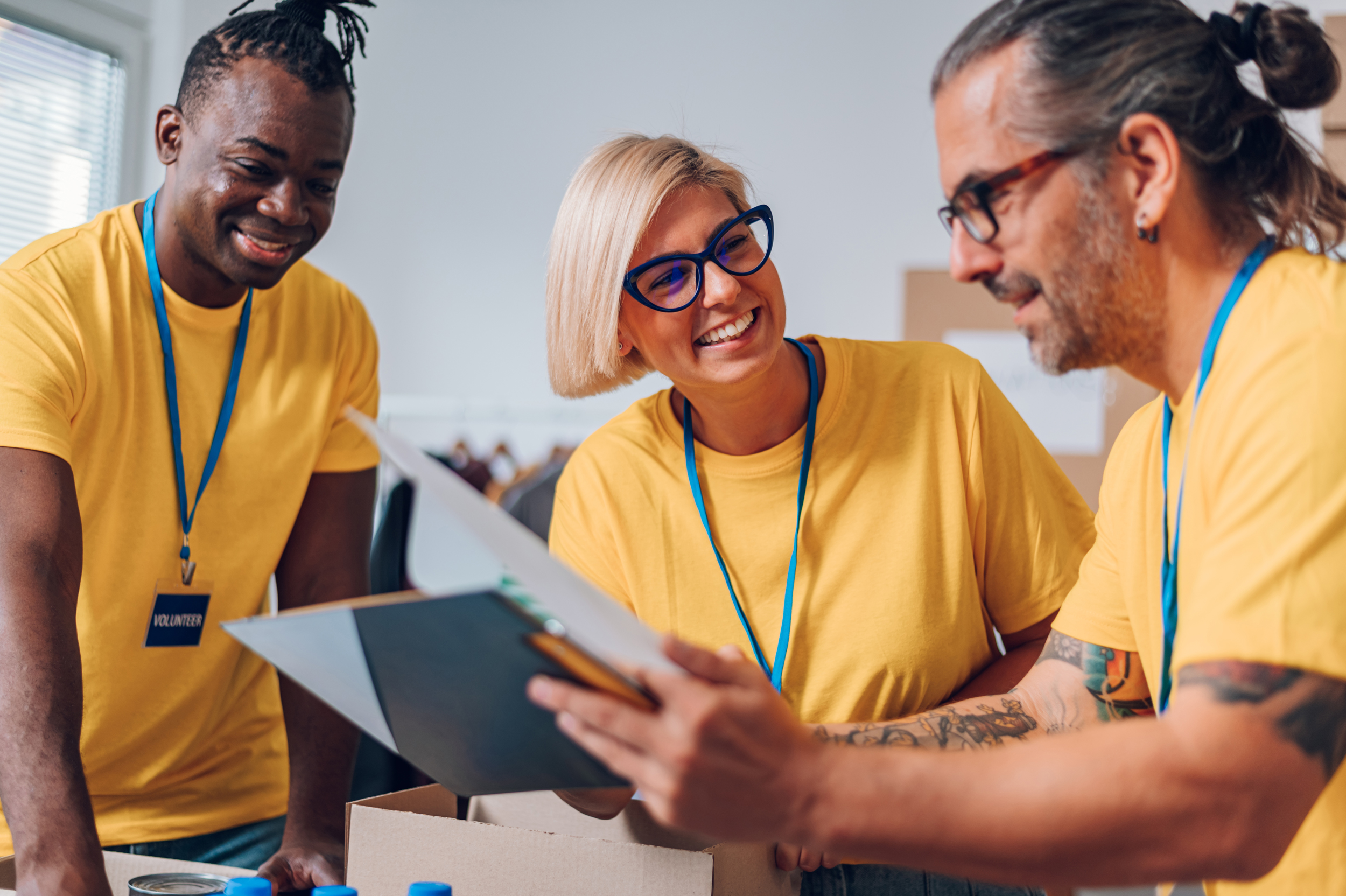 A diverse team of SafeQuest volunteers working together